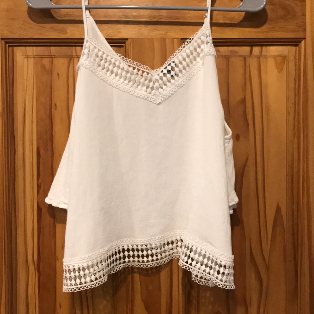 White open shoulder shirt